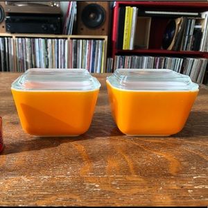 Set of 2 orange vintage Pyrex refrigerator dishes